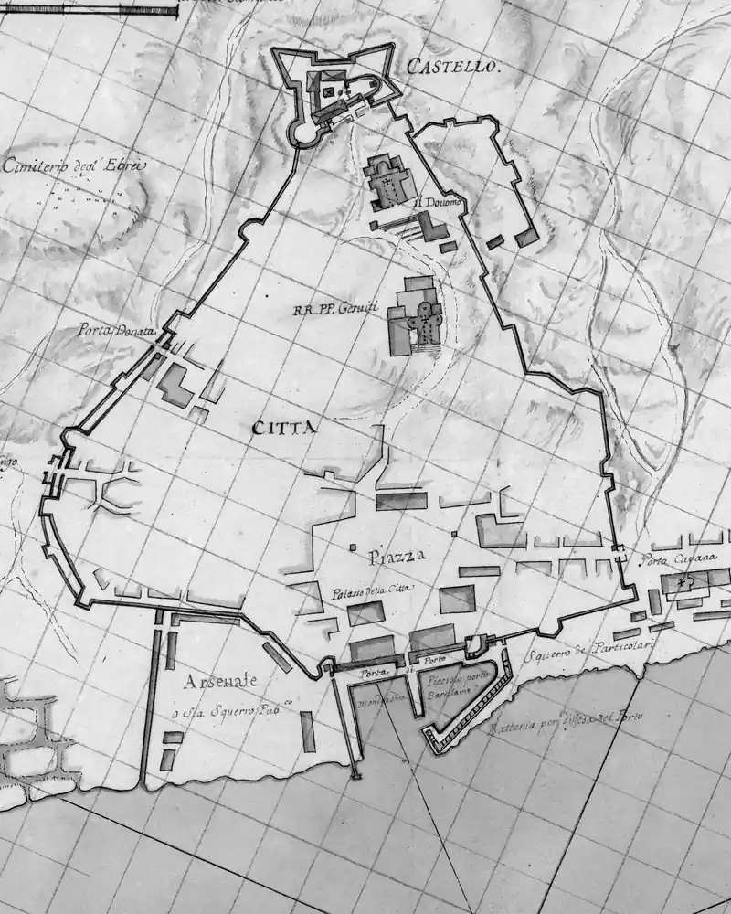 Detail of a historic map in black and white: the walled city and the castle.