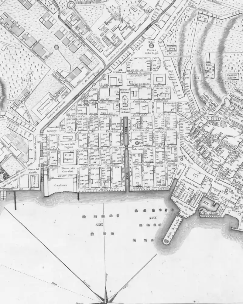 Detail of a historic map in black and white: the free port and the quays.