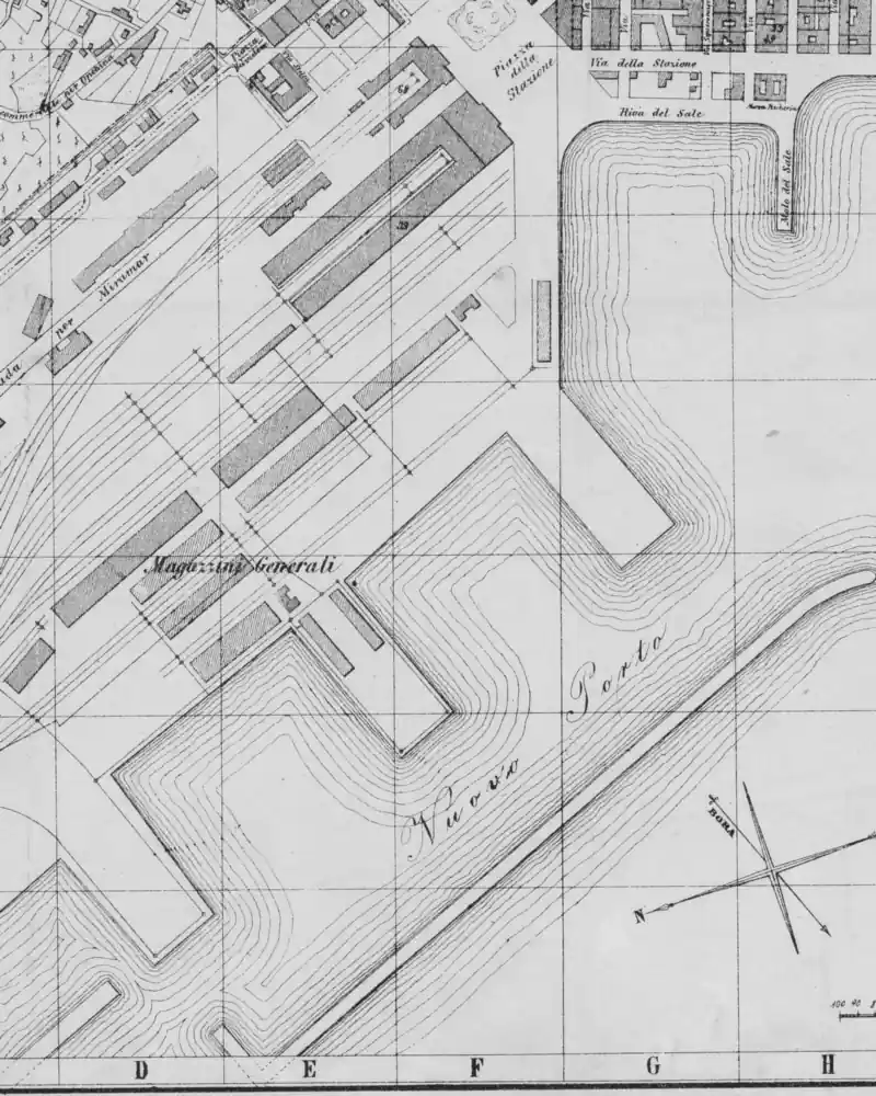 Detail of a historic map in black and white: the piers of the port under construction.
