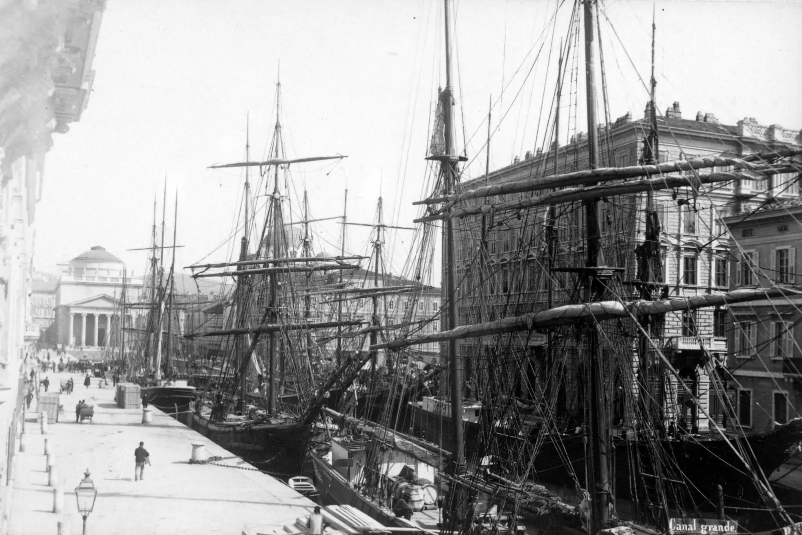 Sailing ships moored in Trieste's Canal Grande in a nineteenth-century photograph.